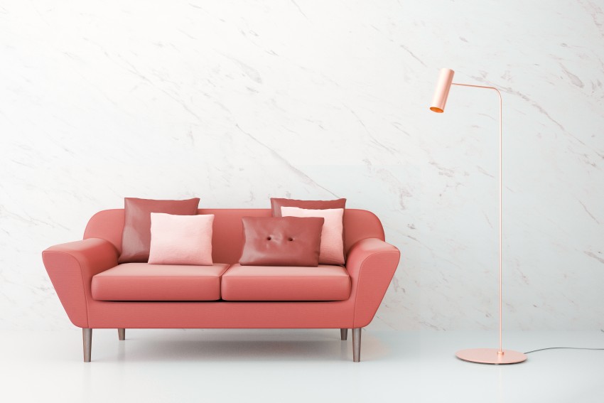 Living coral. The color of the year 2019. The interior room with  sofa and gold lamp at marble wall. 3d illustration.