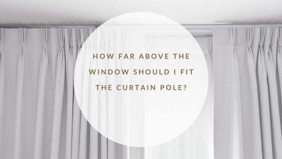 Window with wall fitted curtain pole