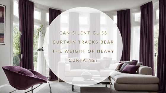Silent gliss curtains in a cost living room in plum colours