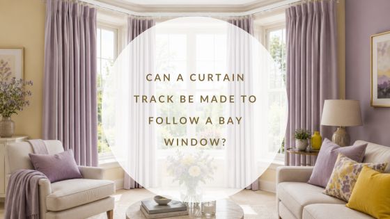 Made-to-measure bay window curtain track with soft lilac curtains in a bright yellow and cream living room.