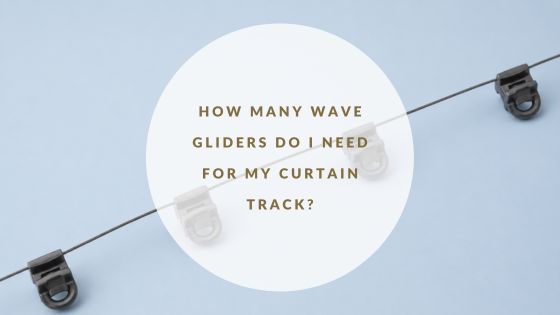 Wave curtain glider cord with evenly spaced black gliders for wave curtain tracks and contemporary curtain headings.